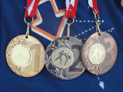 Medale zdobyte przez Tomasza Adamczyka.
